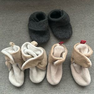 Three pairs of baby booties